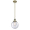 Beacon Mini Pendant shown in the Antique Brass finish with a Seedy shade