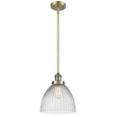 Seneca Falls Mini Pendant shown in the Antique Brass finish with a Clear Halophane shade