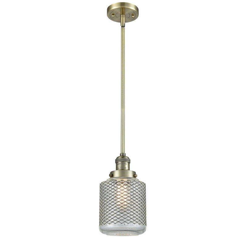 Stanton Mini Pendant shown in the Antique Brass finish with a Clear Wire Mesh shade