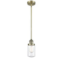 Dover Mini Pendant shown in the Antique Brass finish with a Clear shade