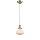 Olean Mini Pendant shown in the Antique Brass finish with a Matte White shade