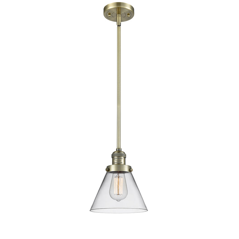 Cone Mini Pendant shown in the Antique Brass finish with a Clear shade