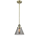 Cone Mini Pendant shown in the Antique Brass finish with a Plated Smoke shade