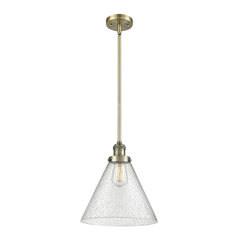 Cone Mini Pendant shown in the Antique Brass finish with a Seedy shade