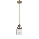 Bell Mini Pendant shown in the Antique Brass finish with a Clear shade