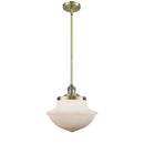 Oxford Mini Pendant shown in the Antique Brass finish with a Matte White shade