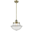 Oxford Mini Pendant shown in the Antique Brass finish with a Clear shade