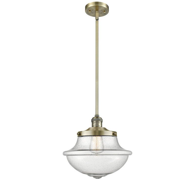 Oxford Mini Pendant shown in the Antique Brass finish with a Seedy shade