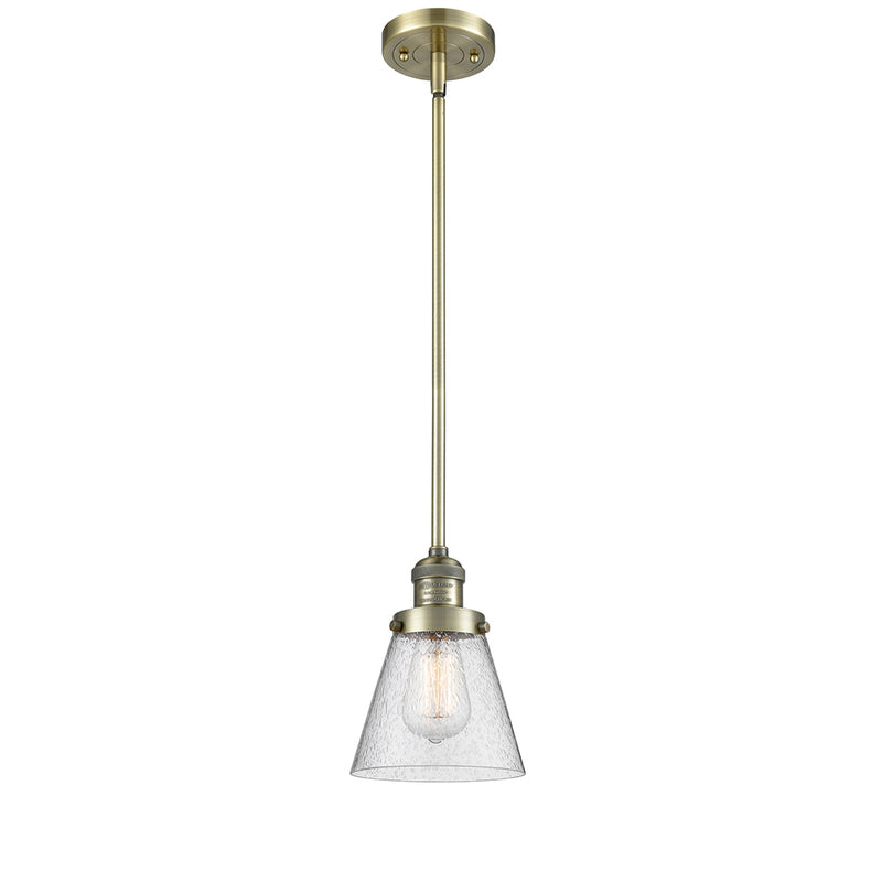 Cone Mini Pendant shown in the Antique Brass finish with a Seedy shade