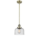 Bell Mini Pendant shown in the Antique Brass finish with a Seedy shade