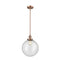 Beacon Mini Pendant shown in the Antique Copper finish with a Seedy shade