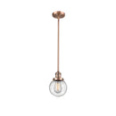 Beacon Mini Pendant shown in the Antique Copper finish with a Seedy shade