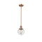 Beacon Mini Pendant shown in the Antique Copper finish with a Seedy shade