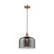 Bell Mini Pendant shown in the Antique Copper finish with a Plated Smoke shade