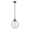 Beacon Mini Pendant shown in the Black Antique Brass finish with a Seedy shade