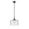Bell Mini Pendant shown in the Black Antique Brass finish with a Seedy shade