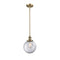 Beacon Mini Pendant shown in the Brushed Brass finish with a Clear shade