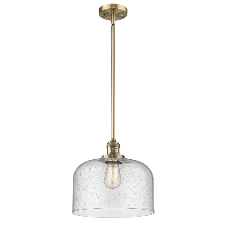 Bell Mini Pendant shown in the Brushed Brass finish with a Seedy shade