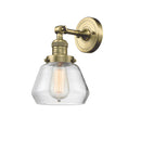 Fulton Sconce shown in the Antique Brass finish with a Clear shade