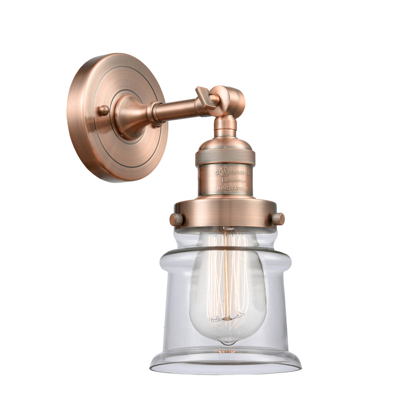 Canton Sconce shown in the Antique Copper finish with a Clear shade