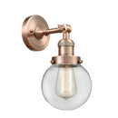 Beacon Sconce shown in the Antique Copper finish with a Clear shade