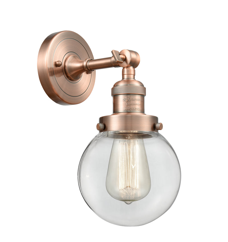 Innovations Lighting Beacon 1-100 watt 6 inch Antique Copper Sconce with Clear glass and Solid Brass 180 Degree Adjustable Swivel With Engraved Cast Cup 203ACG2026