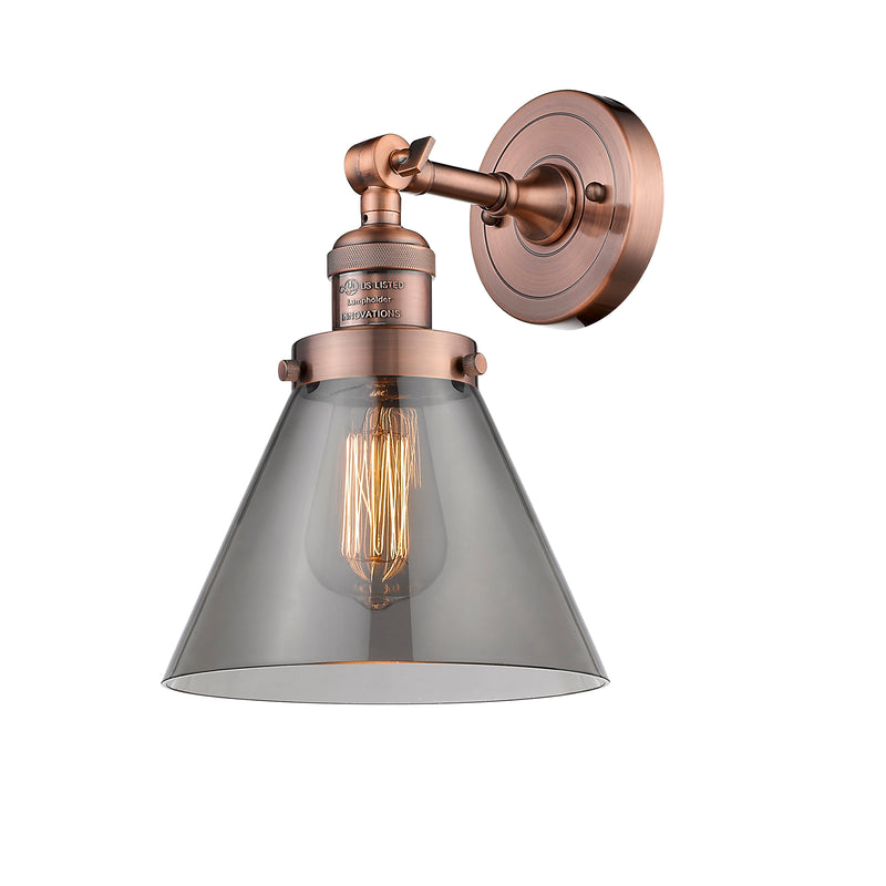 Cone Sconce shown in the Antique Copper finish with a Plated Smoke shade