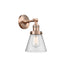 Cone Sconce shown in the Antique Copper finish with a Seedy shade