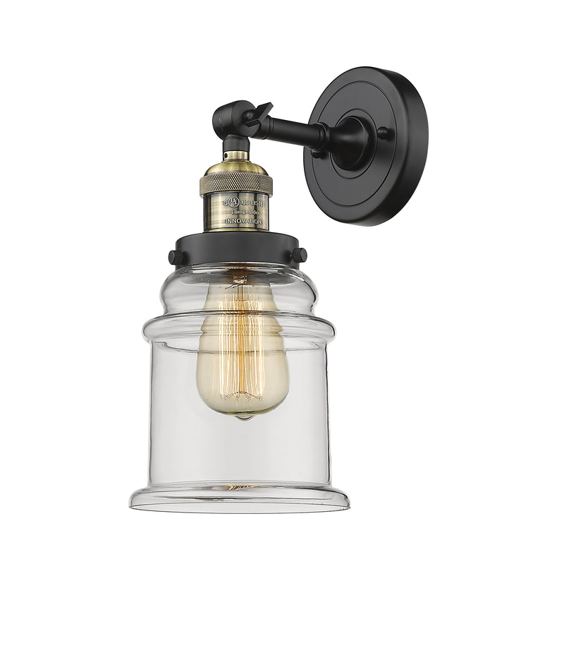 Innovations Lighting Canton 1-100 watt 6.5 inch Black Antique Brass Sconce with Clear glass and Solid Brass 180 Degree Adjustable Swivel With Engraved Cast Cup 203BABG182