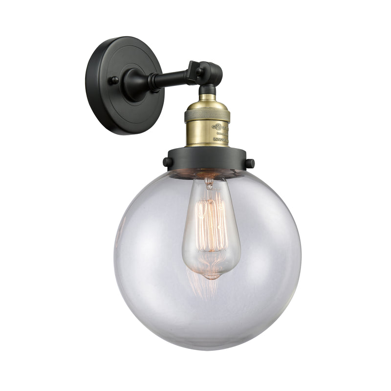 Beacon Sconce shown in the Black Antique Brass finish with a Clear shade