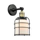 Bell Cage Sconce shown in the Black Antique Brass finish with a Matte White shade