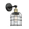 Bell Cage Sconce shown in the Black Antique Brass finish with a Clear shade