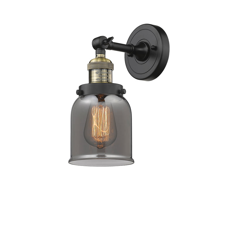 Bell Sconce shown in the Black Antique Brass finish with a Plated Smoke shade