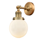 Beacon Sconce shown in the Brushed Brass finish with a Matte White shade