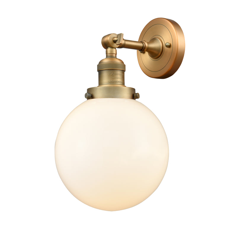 Beacon Sconce shown in the Brushed Brass finish with a Matte White shade