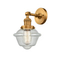 Oxford Sconce shown in the Brushed Brass finish with a Seedy shade