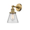 Cone Sconce shown in the Brushed Brass finish with a Clear shade