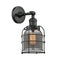 Bell Cage Sconce shown in the Matte Black finish with a Plated Smoke shade