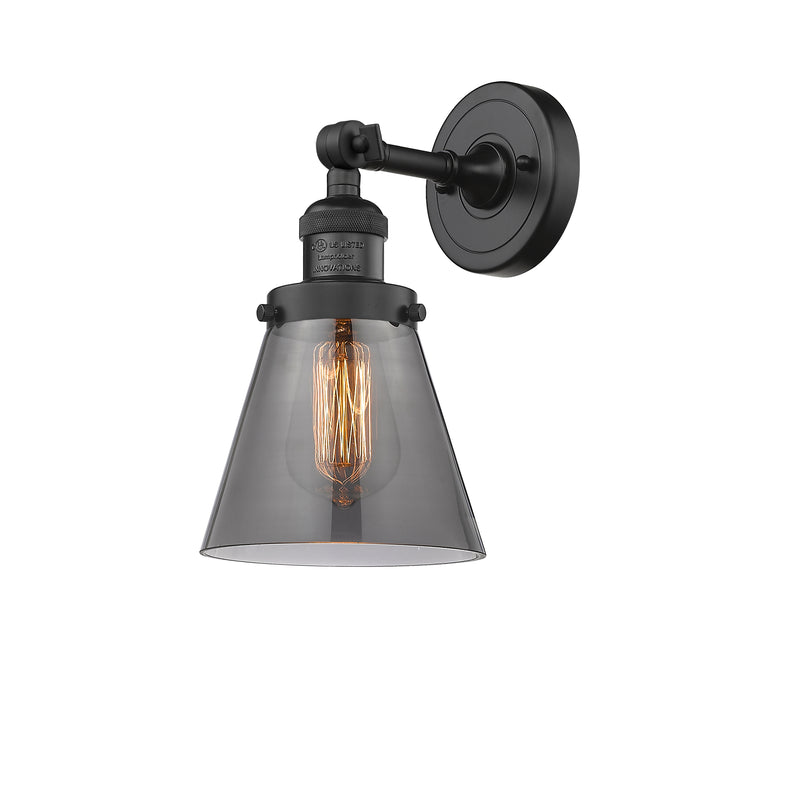 Cone Sconce shown in the Matte Black finish with a Plated Smoke shade