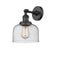 Bell Sconce shown in the Matte Black finish with a Seedy shade