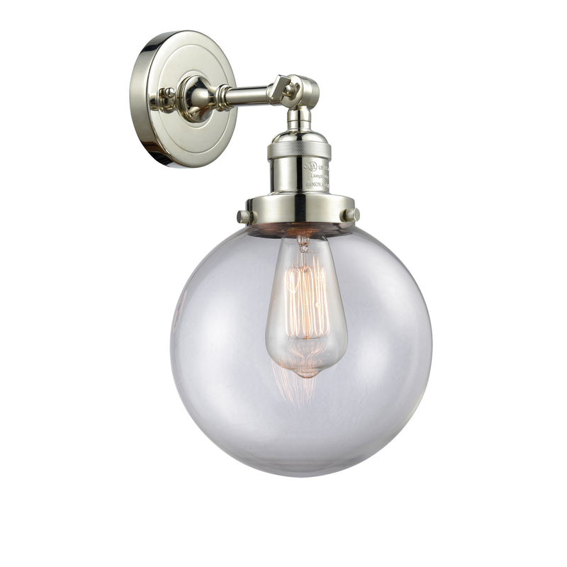 Beacon Sconce shown in the Polished Nickel finish with a Clear shade