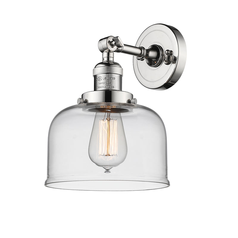 Bell Sconce shown in the Polished Nickel finish with a Clear shade