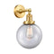 Beacon Sconce shown in the Satin Gold finish with a Clear shade