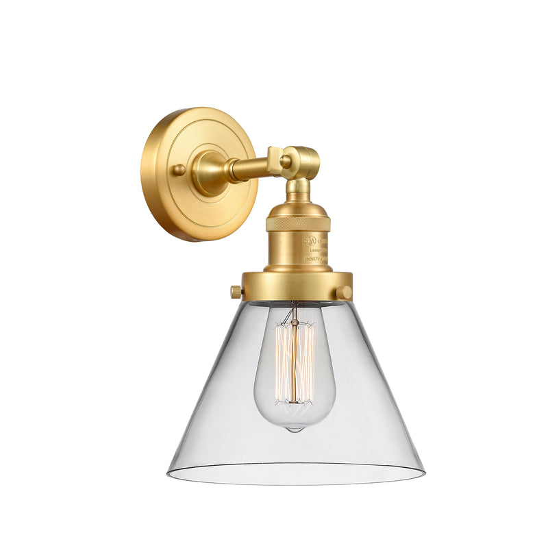 Cone Sconce shown in the Satin Gold finish with a Clear shade