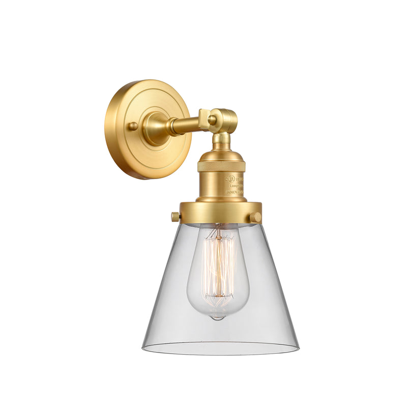 Cone Sconce shown in the Satin Gold finish with a Clear shade