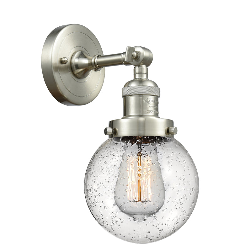 Beacon Sconce shown in the Brushed Satin Nickel finish with a Seedy shade