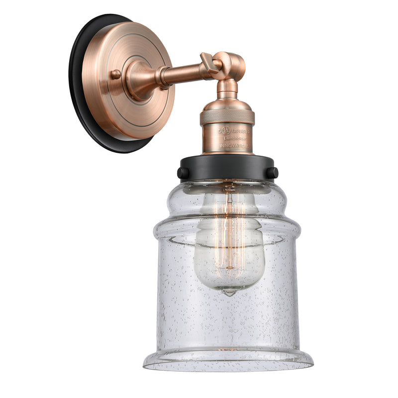 Canton Sconce shown in the Antique Copper finish with a Seedy shade