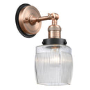 Colton Sconce shown in the Antique Copper finish with a Clear Halophane shade