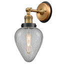 Geneseo Sconce shown in the Brushed Brass finish with a Clear Crackled shade