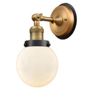 Beacon Sconce shown in the Brushed Brass finish with a Matte White shade